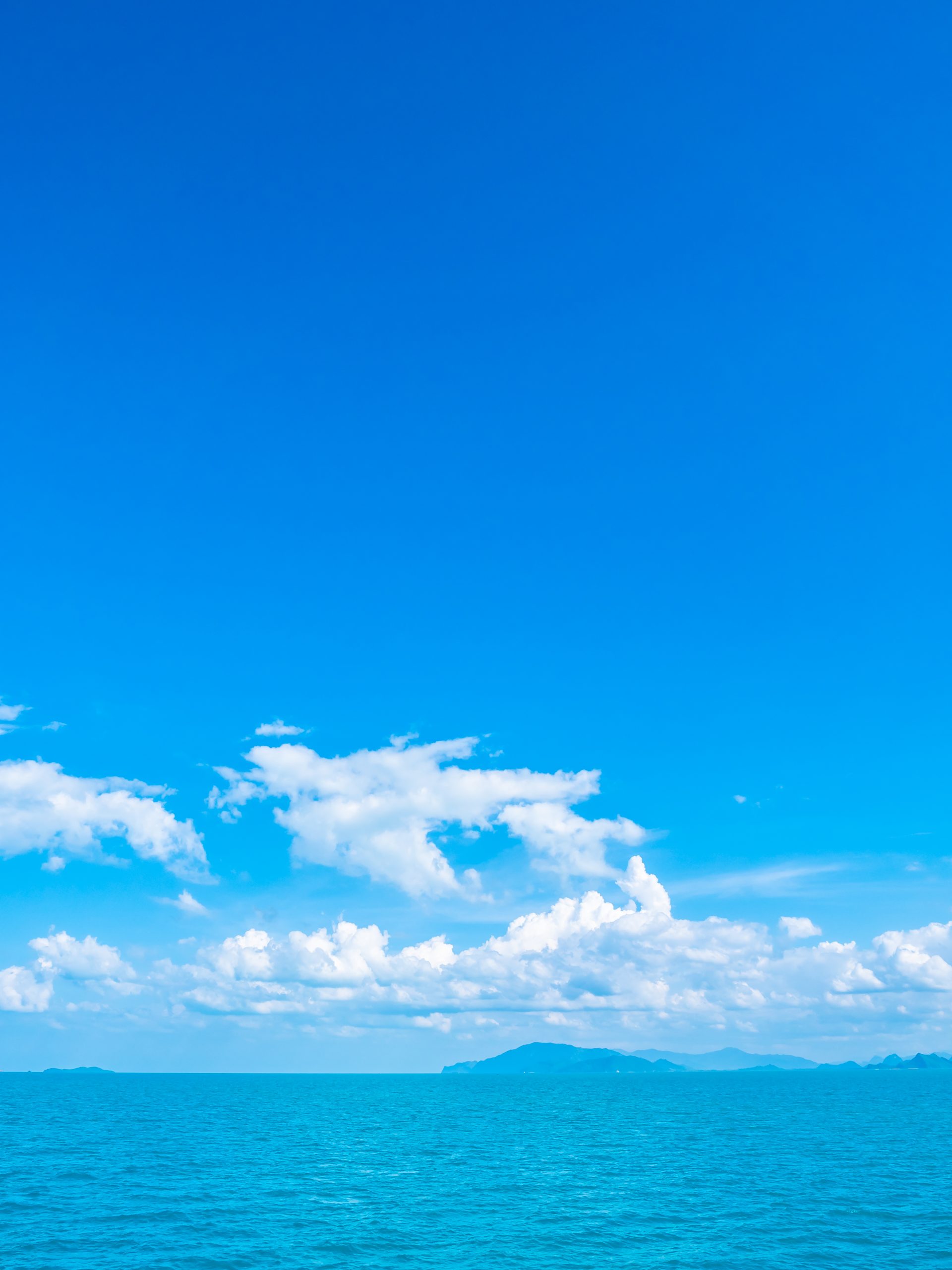 Beautiful sea and ocean on white cloud and blue sky background