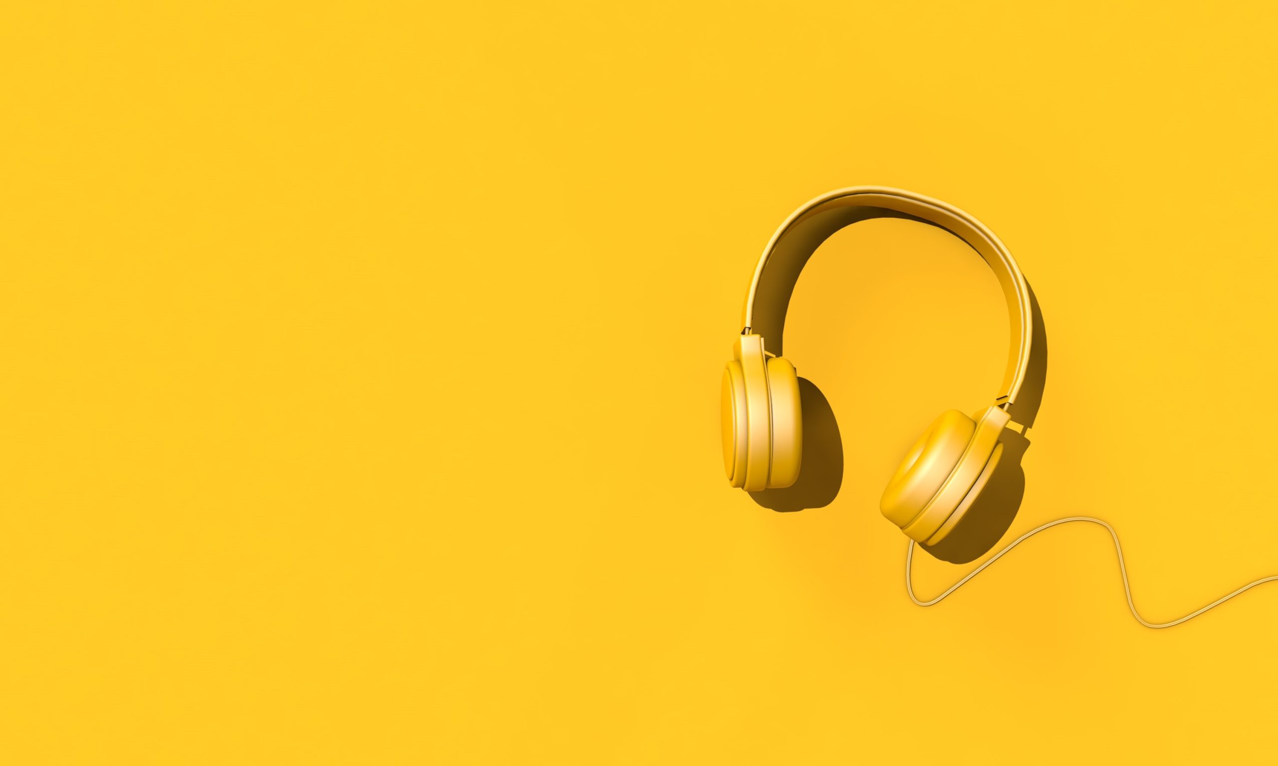 Yellow headset on yellow background. 3D render.